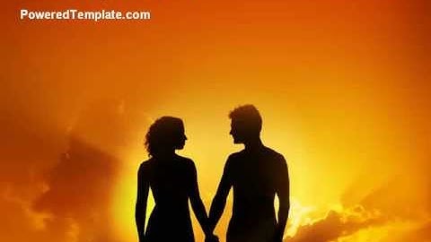 Couple Walking To Sunset PowerPoint Template by PoweredTemplate.com