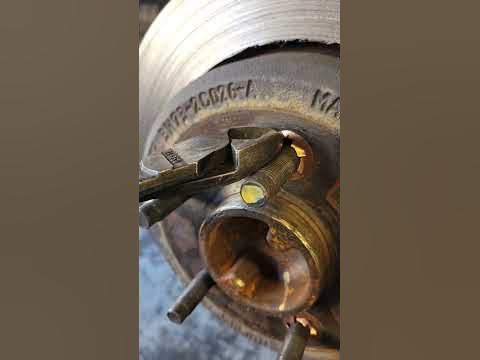tech tip how to remove rotor factory hold down clips - YouTube