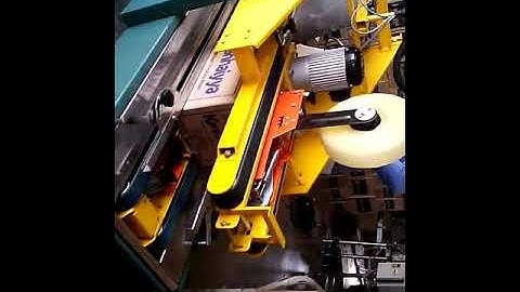 SIGNODE MAKE AUTOMATIC FLAP CLOSING TAPING MACHINE