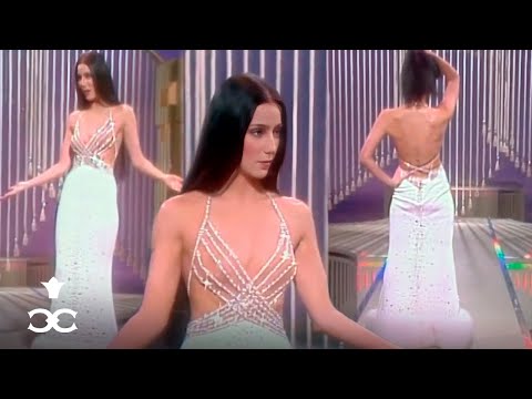 Cher showing the back of her dress