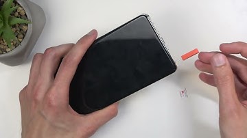 Hoe plaats je een simkaart en SD-kaart in een OnePlus 13?