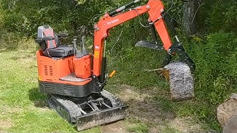 How to install a light weight log grapple on a Groundhog Mini Excavator