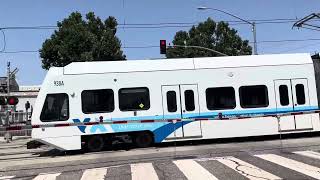 Northbound VTA Green Line Light Rail crosses Barack Obama Boulevard