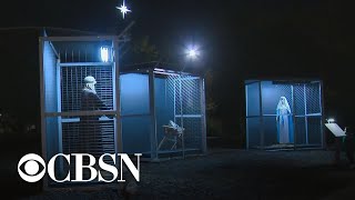 Church nativity scene depicts holy family as caged refugees