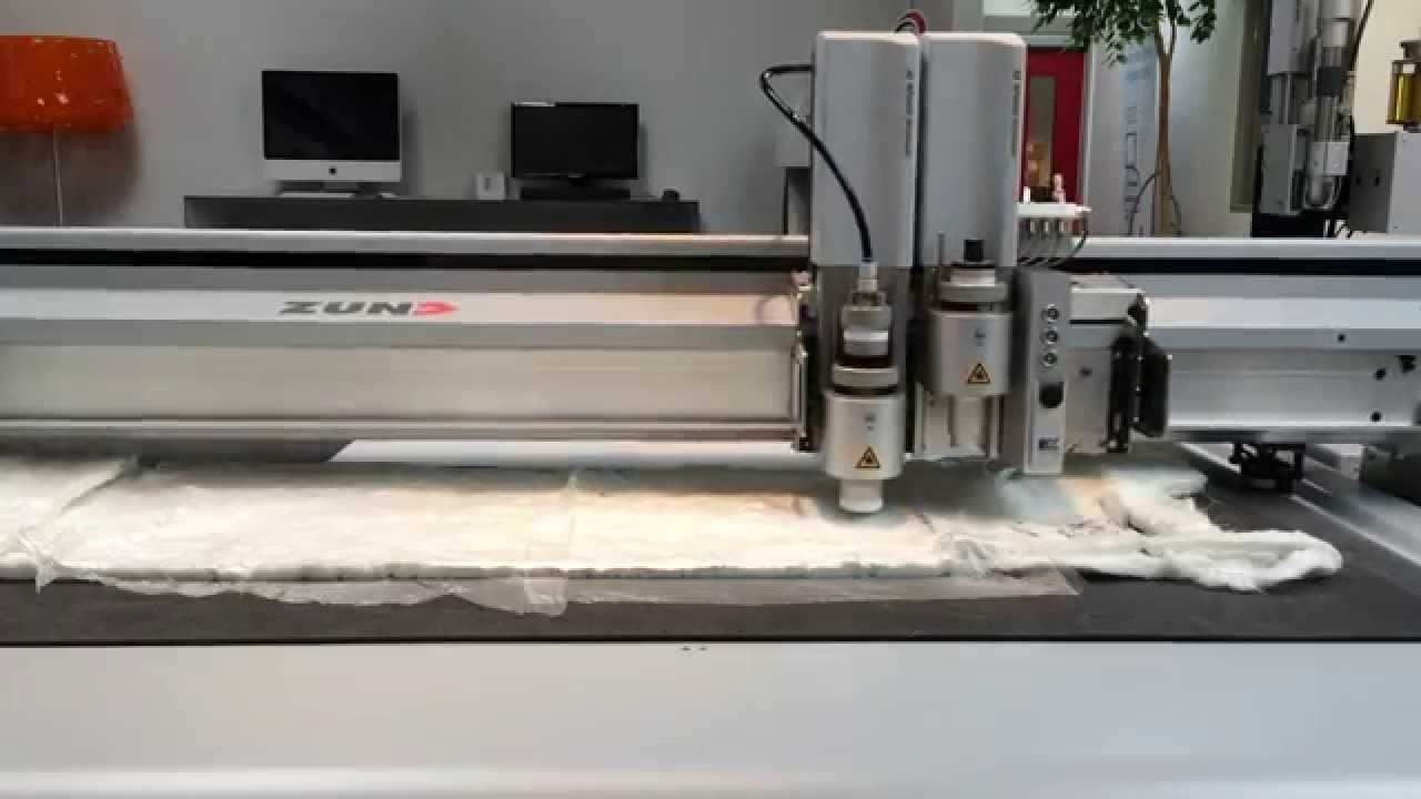 Zünd G3 cutting thick fiberglass mat covered with plastic with