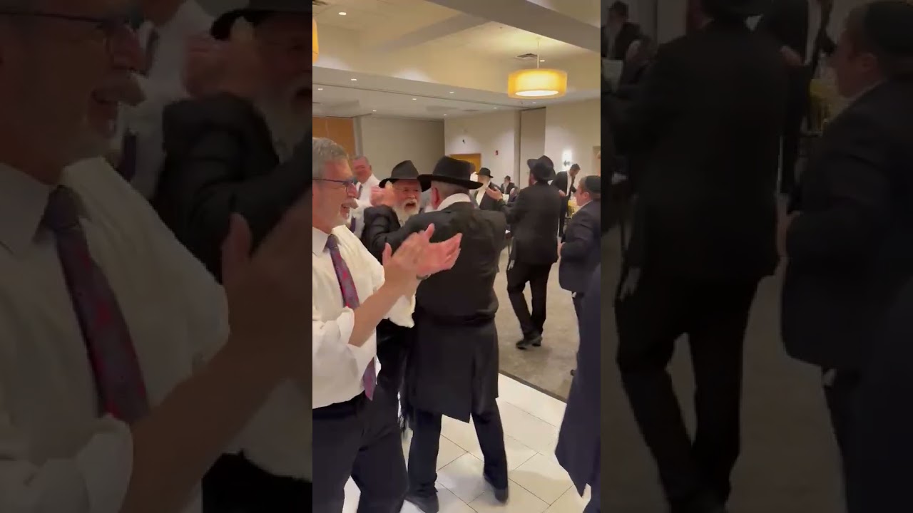 ר' חיים שאול ברוק רוקד עם ר' יוסקה גרינברג