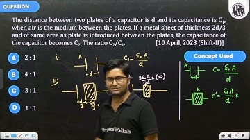 The distance between two plates of a capacitor is \(d\) and its capacitance is \(C_1\), when air....
