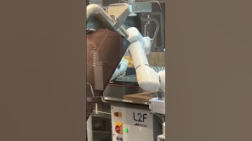 Innovation Kitchens, we got to see the FryBot in action as it automates the deep frying process.