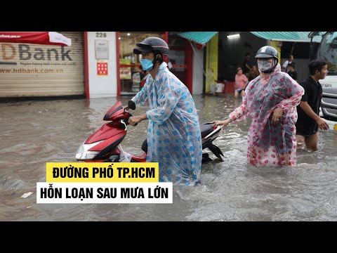 Video Nước ngập chảy xiết như thác, đường phố TP.HCM hỗn... - youtube