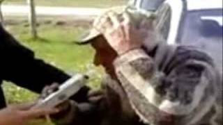 Drunk driver - tries to drink alcohol from breath tester