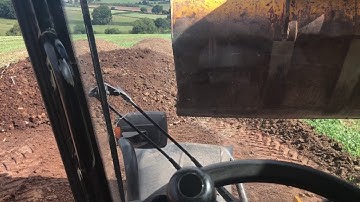 Loading  Muck with jcb