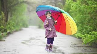 Little girl with umbrella in hands jumping in the rain screenshot 4