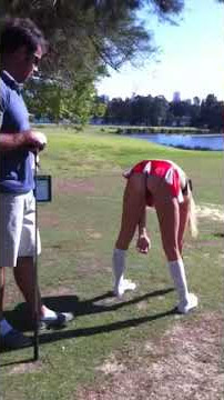 Hot skimpy bends over