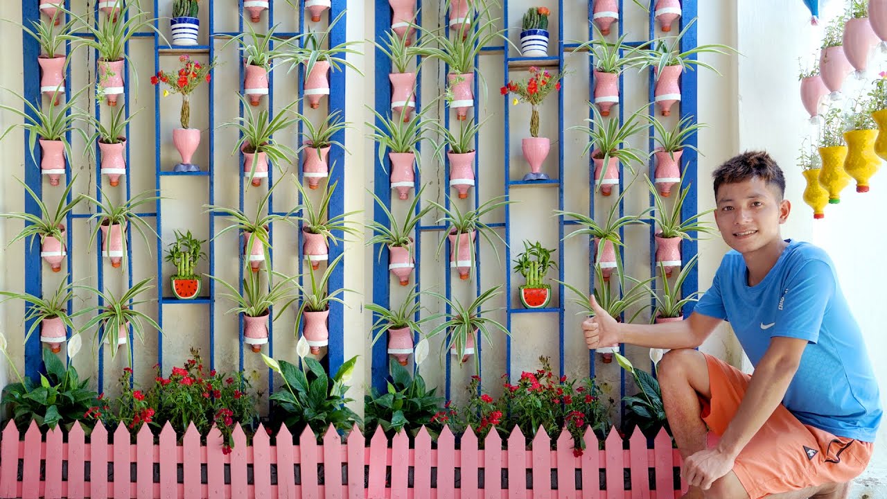 DIY Vertical Wall garden from Plastic Bottles and Wood for Porch Garden