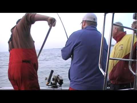 Shawn Knieling catches a salmon