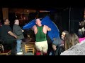 Man wrestles a Tent