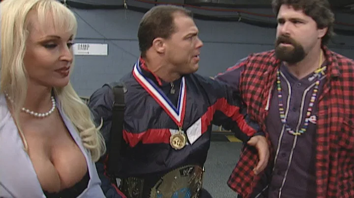 Mick Foley & Debra confront Kurt Angle, Triple H &...