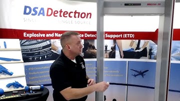 Sensitivity adjustment on a walk through metal detector