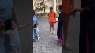 Play Holi As Watches Them Play With Colors