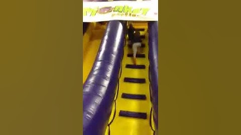 Trev climbing inflatable slide