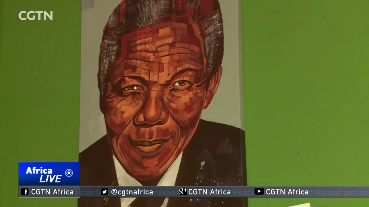 Ugandan artist turns people's faces into inspirational artwork