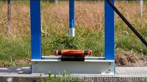 Crushing dynamite with hydraulic press