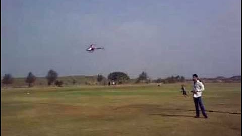 JIM FLYING HIS RC BELT CP V2 ESKY HELICOPTER.mp4