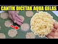 Rengginang mekar dicetak bekas gelas air mineral