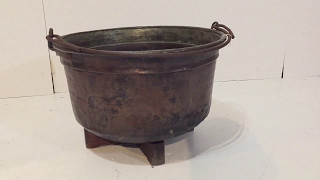 A lovely old Hungarian copper cauldron / Industrial cooking pot, with lots of character and charm. It has a handle and old wooden 