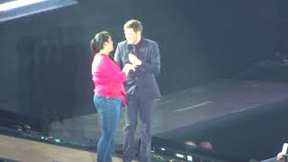 Michael buble brings fan onstage to play piano close ur eyes croke park