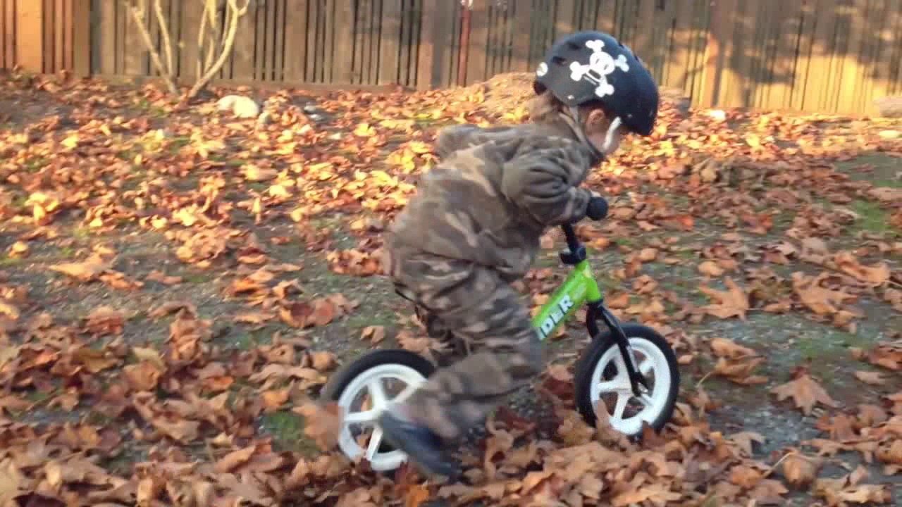 Copy of Strider Balance Bike Cruising & Gliding Over Grass, Dirt and