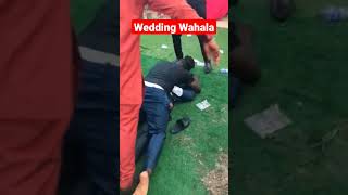 Wedding goes wrong as Grooms friends pour water on groom and display at the wedding.