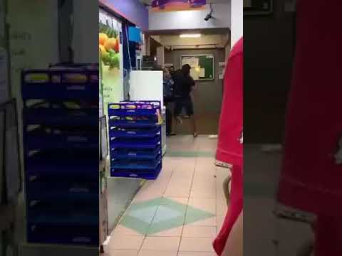 2 men fighting outside Fairprice supermarket at Bedok 85