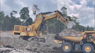 Backhoe Excavator Caterpillar 6020 Loading Dumper Komatsu 785 and Caterpilaar 777.