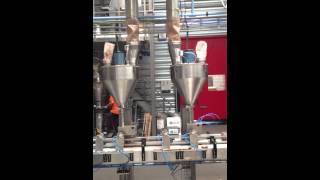 Automatic pot filling of coconut sugar position one volumetric second position top up weighing