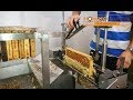 Koud geslingerde rauwe honing oogsten op Nederlandse imkerij