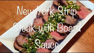 New york strip steak with board sauce