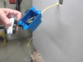 How install an electric outlet in an existing wall