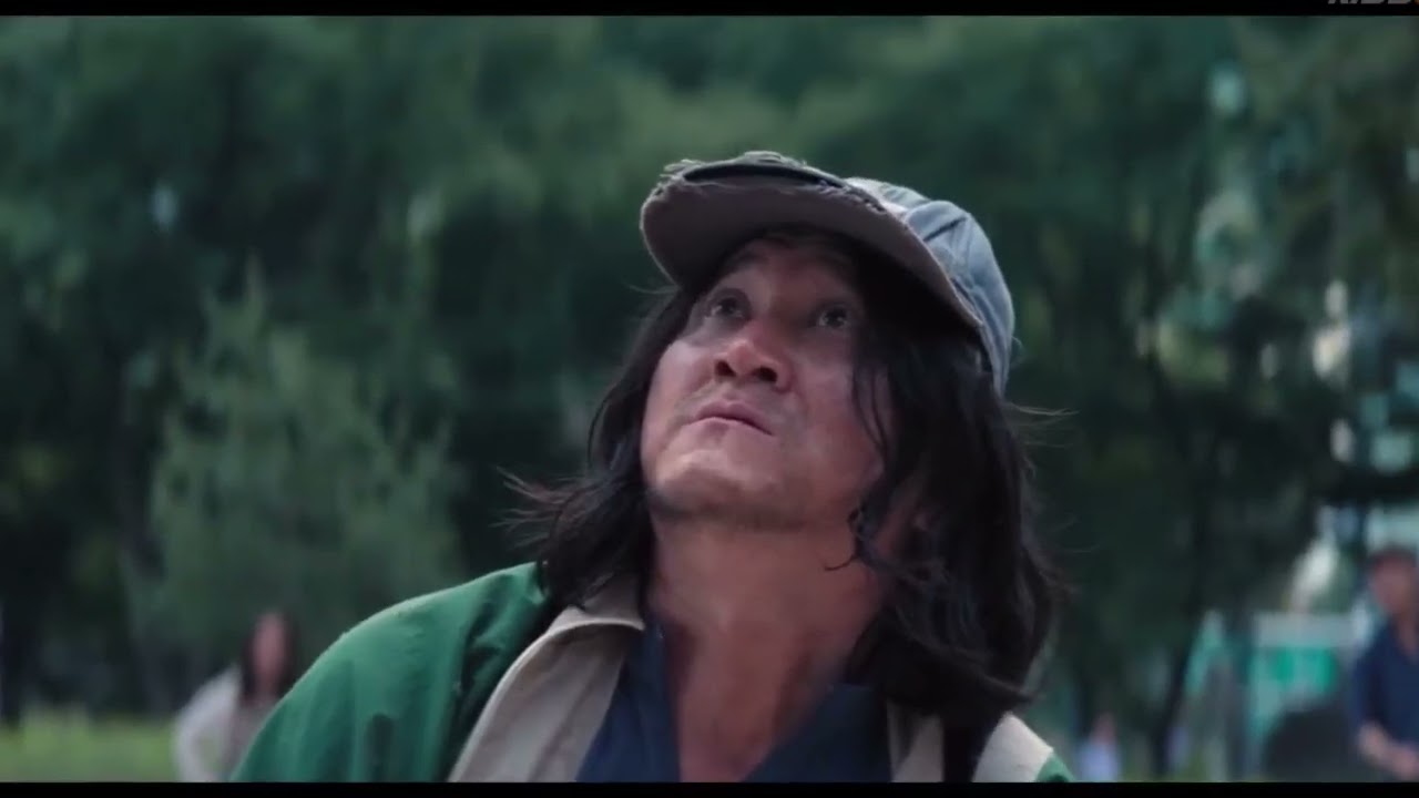 Squid Game 2 - Recruiter Salesman Gong Yoo Stomps on Bread After Offering them to the Homeless