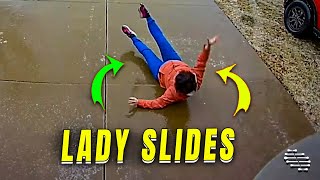 Woman Slides Down Driveway on an Icy Day