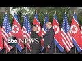 Kim jong un trump shake hands for the first time