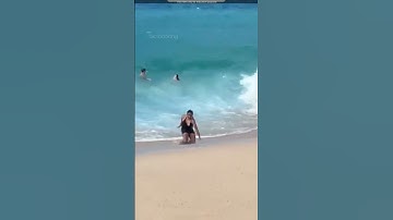 Life Guard Save Lady Life From Waves| #shorts #shortsviral | @Factbooking |