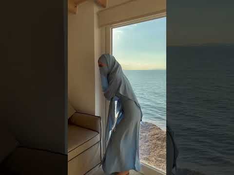Matching the blue Abaya with the beach view. 💙 Full outfit available on: www.fatimadetetuan.com