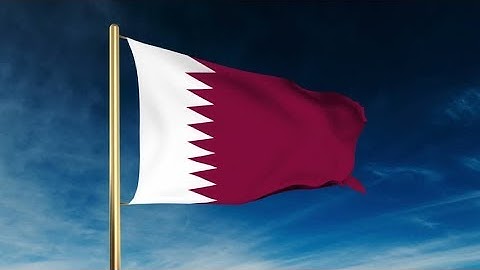 4K Qatar flag slider style. Waving in the win with cloud background animation Stock video