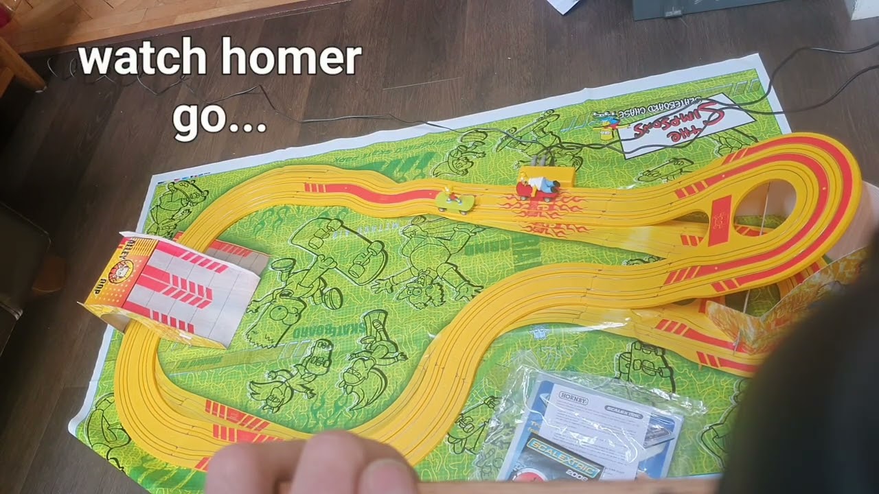Micro Scalextric - The Simpsons race : Homer or Bart. Who would you choose?