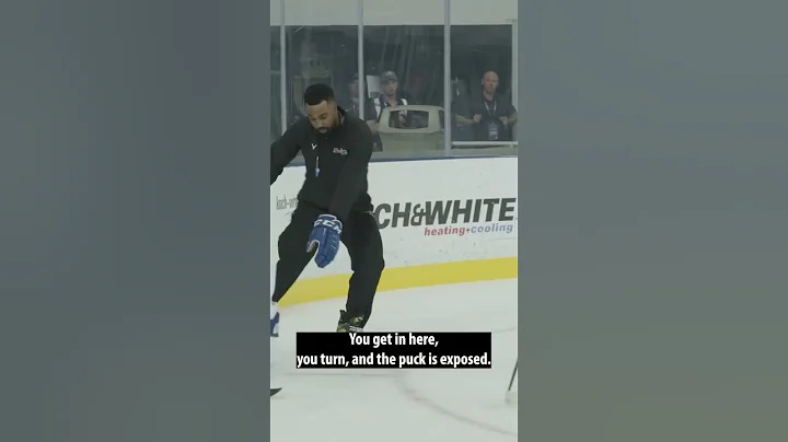 Nathaniel Brooks explains puck protection off the ...