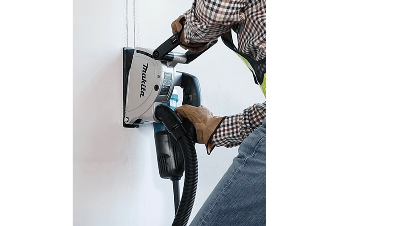 Makita SG1251J Wall Chaser / Concrete Cutter for Grooving 5" 1400W.Net weight 4.3Kg.