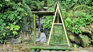 Build a shelter  in 5 days under a waterfall on the bank of a stream  Tropical forest
