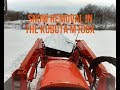 KUBOTA UTILITY TRACTOR- PUSHING SNOW