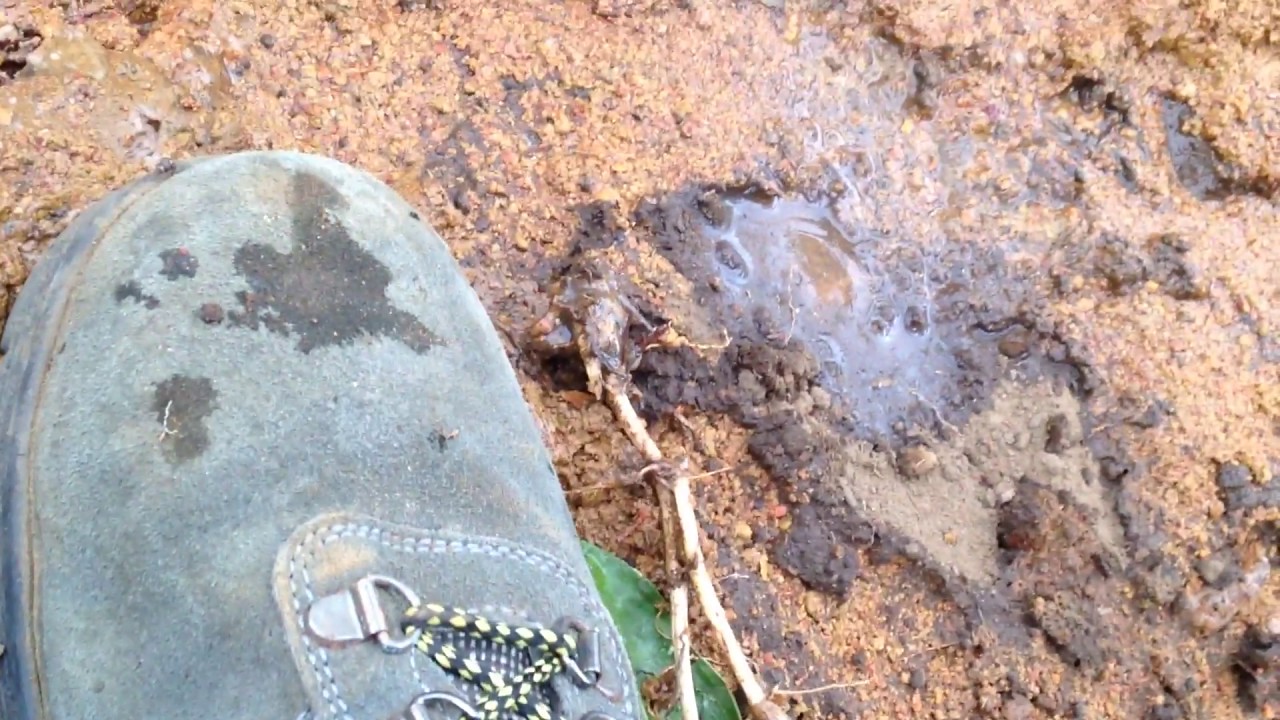 Village Water Projects - Village life - Nasty polymer mud on my boot!